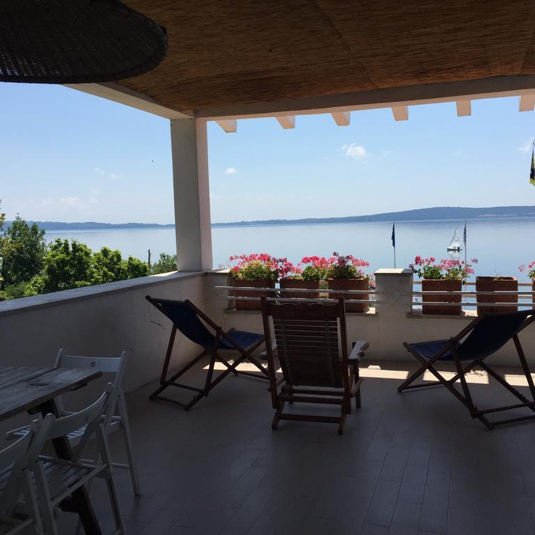 Verde Blu Lakefront Boutique Holiday Apartments Тревиньяно-Романо Номер фото